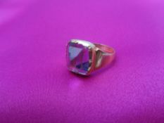 22CT GOLD AMETHYST SET SIGNET RING - the stone mounted pyramid style, facet cut, size mid N - O,