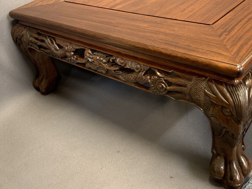 20TH CENTURY CHINESE HARDWOOD OVERSIZE COFFEE TABLE - lower carved frieze detail and mask corners on - Image 2 of 3