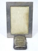 CHESTER SILVER PHOTOGRAPH FRAME and a sterling stamped cigarette case, the frame date stamp