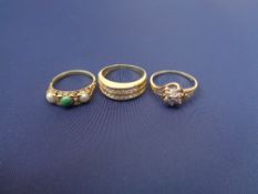 9CT & 14CT GOLD DRESS RINGS (3) - a twisted mount example with a floral cluster of tiny diamonds,