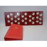 BIRMINGHAM MINT COMMEMORATIVE SILVER MEDALLIONS, A COLLECTOR'S ALBUM OF 26 for the 150th Anniversary