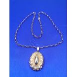 9CT GOLD NECKLACE WITH A VICTORIAN UNMARKED GILT METAL LOCKET - 61cms necklace length, 7.2grms