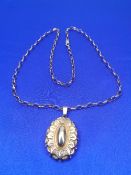 9CT GOLD NECKLACE WITH A VICTORIAN UNMARKED GILT METAL LOCKET - 61cms necklace length, 7.2grms