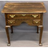 VINTAGE OAK LOWBOY - having a shaped top over one long and two short crossbanded drawers with