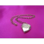9CT GOLD HEART LOCKET - on a belcher chain necklace with clip clasp, the heart stamped '9ct' back