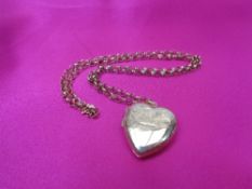 9CT GOLD HEART LOCKET - on a belcher chain necklace with clip clasp, the heart stamped '9ct' back