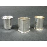 TWO SILVER BOTTLE HOLDERS - 1. Plain square, Birmingham 1943, 3ozs, 7cms H and, 2. Plain circular,