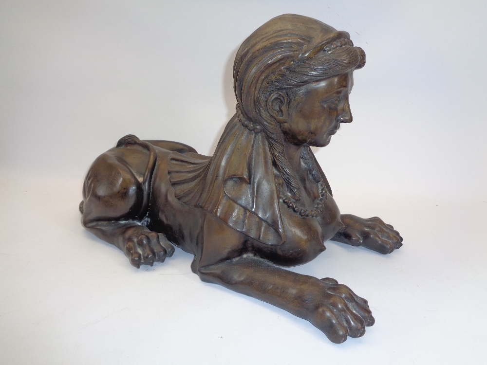 REPRODUCTION CAST BRONZE RECUMBENT SPHINX - 34cms H, 29cms W, 56cms L