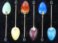 SILVER & ENAMEL COFFEE SPOONS - a cased set of six Harlequin bean handled coffee spoons with