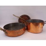 ANTIQUE COPPER & BRASS COOKING PANS, LARGE & HEAVY - a shallow circular pan with twin brass carry