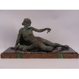 FRENCH ART DECO SPELTER & MARBLE FIGURINE depicting a scantily clad reclining female and a recumbent