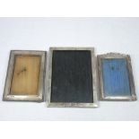 SILVER FRONTED PHOTOGRAPH FRAMES (3) - Birmingham hallmarks, various dates and conditions, 20 x