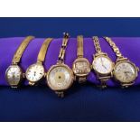 LADY'S 9CT GOLD WRISTWATCHES (6) - five being 9ct gold cased with plated bracelet straps, the