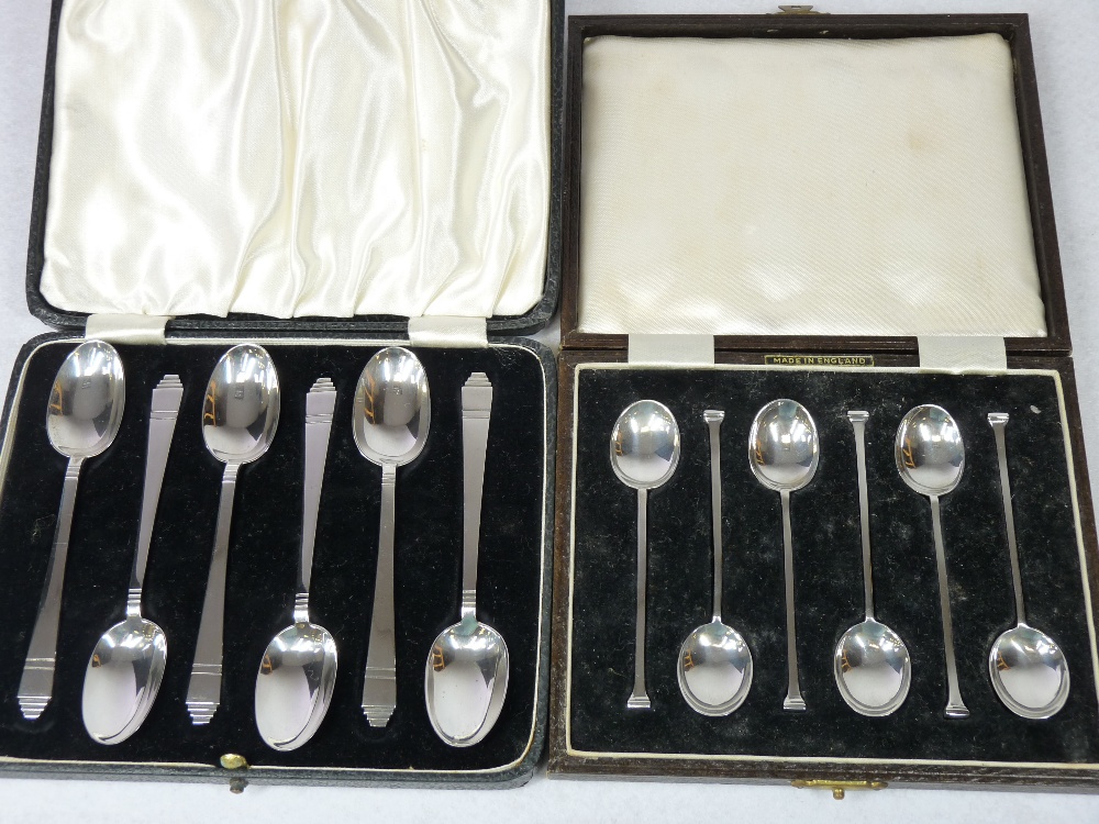 SILVER COFFEE SPOONS - 1. A cased set of six with shaped and tapered handles, Sheffield 1938, 2.3ozs