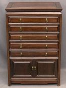 CHINESE HARDWOOD COLLECTOR'S CHEST of five baize line drawers over twin lower cupboard doors, 91.