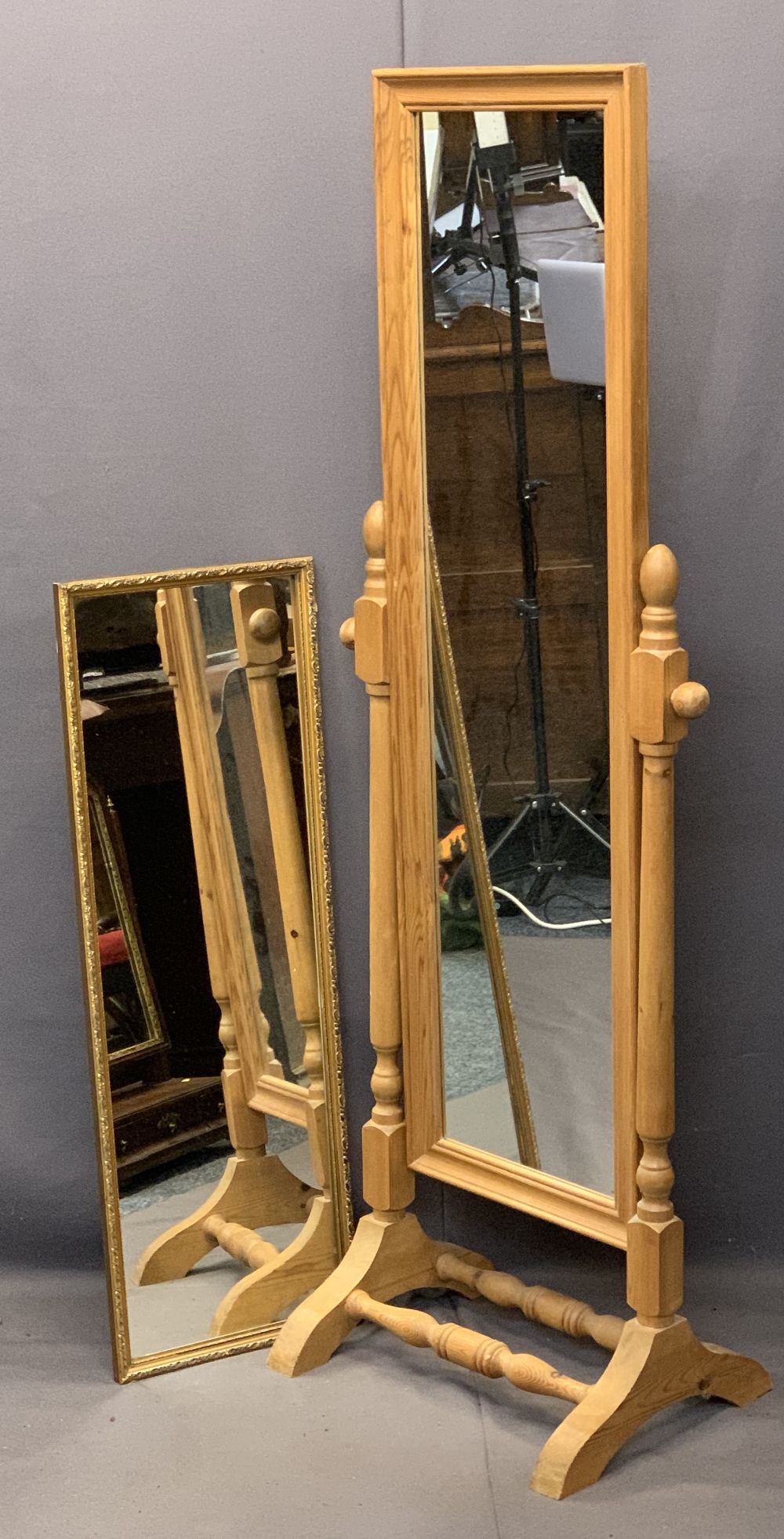 MODERN PINE CHEVAL DRESSING MIRROR and a gilt frame wall mirror, 149cms H, 51cms W and 94cms H x
