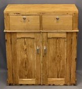 STRIPPED PINE VINTAGE CUPBOARD having two upper drawers and twin lower cupboard doors, 85cms H,