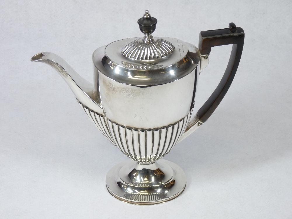 A SILVER COFFEE POT - of oval form with half reeded body to a shallow pedestal, handle and knop - Image 3 of 3