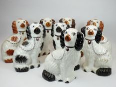 STAFFORDSHIRE DOGS - four reproduction pairs, 23.5cms tall
