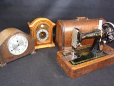 SINGER SEWING MACHINE IN A WOODEN CASE and two mantel clocks including Tempus Fugit Bentima with