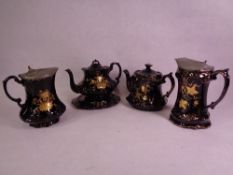 JACKFIELD TEA & COFFEE POTS including two with pewter lids and a stand