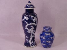 CHINESE PRUNUS BLOSSOM LIDDED VASE, 28cms tall and a lidded ginger jar, 15cms tall