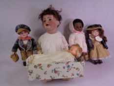 VICTORIAN PORCELAIN HEADED DOLL, 60cms L, a quantity of other dolls