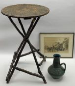 VINTAGE BRIARWOOD CIRCULAR TOP TABLE, framed black and white mezzotint and a German stoneware jug,