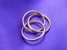 AN 18CT GOLD TRIPLE RING SET - 10.3grms in original Boodle's box