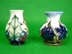 MOORCROFT POTTERY VASES (2) 'Holly and Berry' by Phillip Gibson - cream ground, 10cms H, impressed