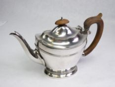 SILVER TEAPOT - of oval plain form with narrow lined decoration, 12.7ozs gross, Birmingham 1921