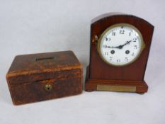 A MAHOGANY ENCASED CIRCULAR DIAL MANTEL CLOCK - with eight day French movement (for restoration) and