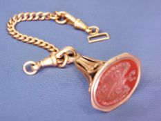 A LARGE OVAL BLOOD STONE COCKEREL SEAL in a believed 9ct bell shaped mount together with a short