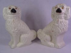 STAFFORDSHIRE COMFORTER DOGS, A PAIR, 40cms tall