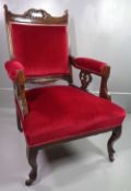 EDWARDIAN ARMCHAIR, a fine example in upholstered red velvet velour, on castors