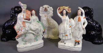 STAFFORDSHIRE FLATBACKS - two Scottish group figures, also a pair of black Staffordshire dogs and