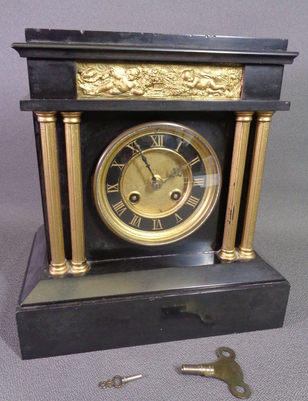 SLATE CLOCK with Roman numerals, eight day movement, 26cms H, 26cms W, 15cms D