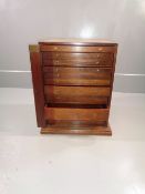 ANTIQUE SPECIMEN CHEST with Wellington style lock and a graduated set of ten drawers, 63cms H, 52cms
