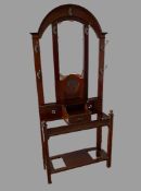 EDWARDIAN HALLSTAND with multiple hooks, bevelled glass mirror and drawer centre section, 210cms