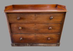 MAHOGANY WASHSTAND with three long drawers having turned knobs, 89cms H, 117cms W, 53cms D