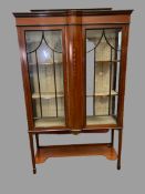 CHINA CABINET - Edwardian mahogany, two door on spade feet, with lower shelf and railback top,