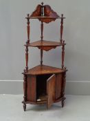 ROSEWOOD CORNER WHATNOT - three shelved with lower cupboard and inlaid decoration, 137cms H, 62cms