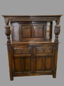 19th CENTURY COURT CUPBOARD with carved and panelled front, 153cms H, 122cms W, 51cms D