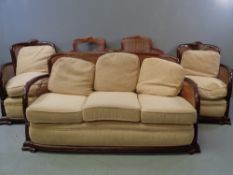 EDWARDIAN BERGERE LOUNGE SUITE comprising three seater sofa, 75cms H, 160cms W, 88cms D and two