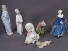 LLADRO FIGURES (5) - a bear, two typical girl figurines, an Eskimo and polar bear and a cherub and a