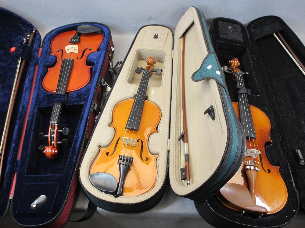 PRE-LOVED MODERN VIOLINS WITH BOWS - in fitted cases (3) to include a Stentor Student 2 3/4 size,