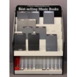 MUSIC SHOP DISPLAY STANDS FOR BEST SELLING MUSIC BOOKS (4) - on castors, 137.5cms H, 101cms W, 51cms