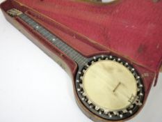 THE BARNES MULLINS PERFECT NO 1 BANJO IN A FITTED LEATHER CASE