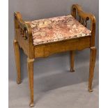 WALNUT BOX SEAT PIANO STOOL - having shaped sides on spindle gallery and tapering supports, 62cms H,