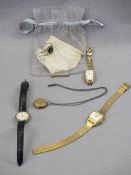 15CT GOLD TIE CLIP, 2grms, three modern lady's wrist watches, ETC, including a gilt oval locket on